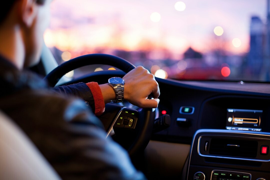 driver enjoying premium car features